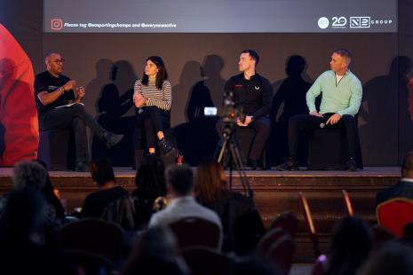 Athletes speaking on stage at a recent Sporting Champions event