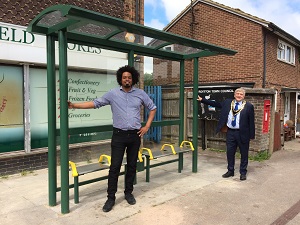 Councillors at the newly installed bus shelter in Royston