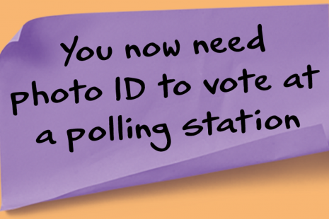 Post-it note saying You now need photo ID to vote at a polling station